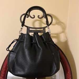 Cole Haan drawstring bag smoke-free environment